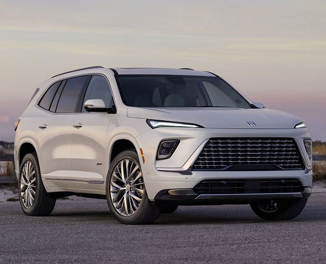 Three-Quarters View of a 2025 Buick Enclave Parked Under an Evening Sky