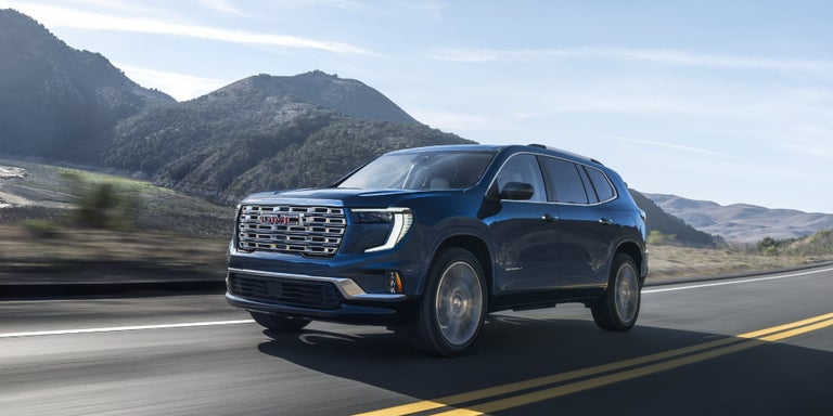 A Service Technician completing work on a vehicle